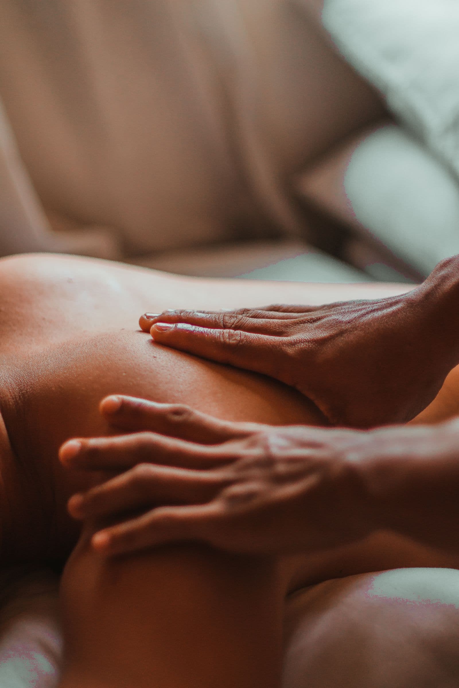 Hands giving a guest a restorative massage